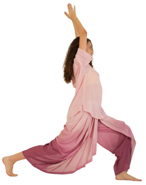 Woman in Anahata Pink ombre YogaFlow set holding high lunge — sheer cotton flowing as she rises in breath and grace.